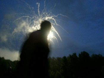 Close-up of woman against sky