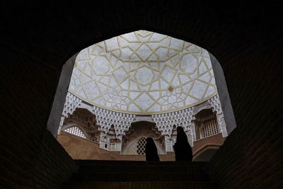 Low angle view of ornate ceiling of building