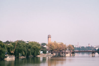 River by city against clear sky