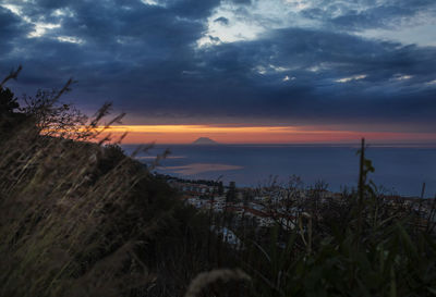 Scenic view of sea against sky during sunset