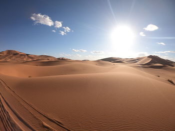 Scenic view of desert against sky