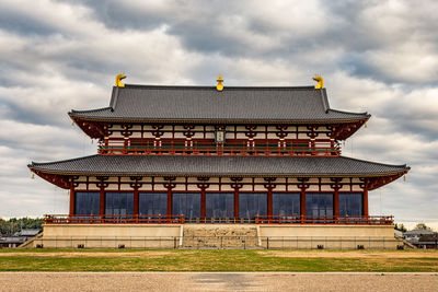 Exterior of temple building against sky