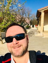 Portrait of young man wearing sunglasses