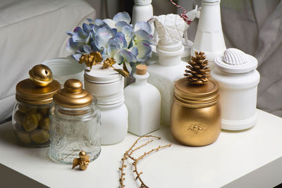 Close-up of containers on table