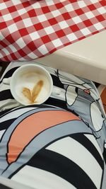 Close-up of cappuccino on table