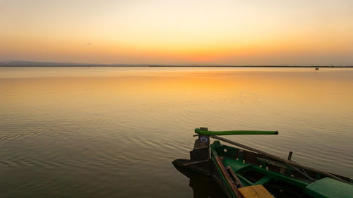 Scenic view of sea at sunset