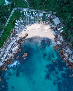 High angle view of rocks by sea