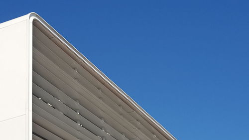 Low angle view of building against blue sky