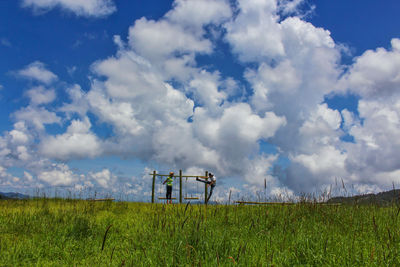 Scenic view of field against sky