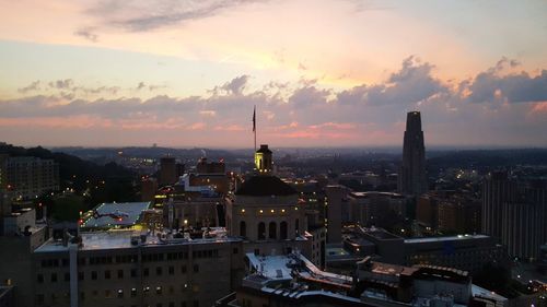 Aerial view of city at sunset
