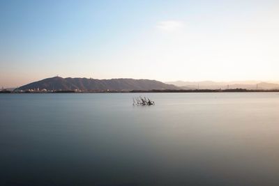 Scenic view of boats in sea