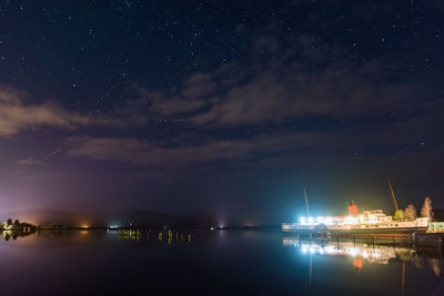 Scenic view of sea against sky at night