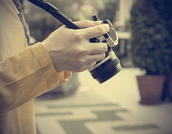 Close-up of woman holding hands