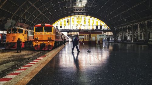 People on railroad station platform