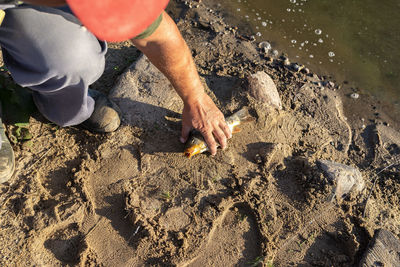 High angle view of man working at beach