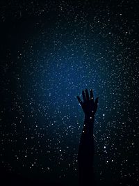 Silhouette people at night