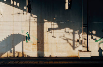 Shadow of people on wall
