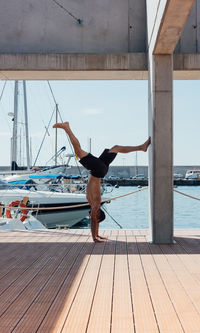 Sportsman practicing stretching and calisthenics