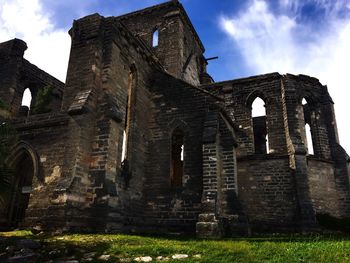 Low angle view of old building against clear sky