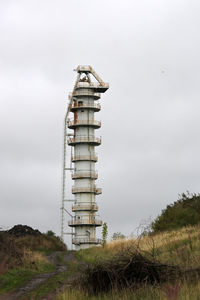 Disused industrial tower with viewing platforms at many levels