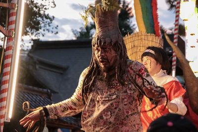 Portrait of young woman looking at camera