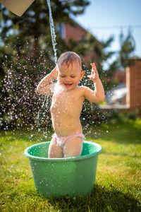 Boy playing in water