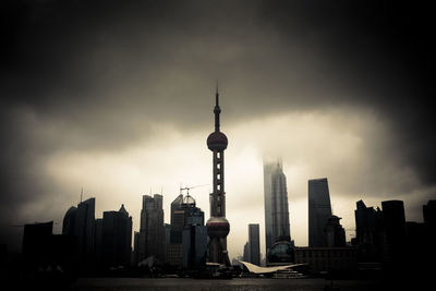 Modern buildings in city against sky