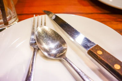 Close-up of spoon on table