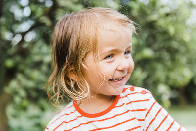 Portrait of cute girl outdoors