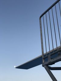 Low angle view of built structure against clear blue sky