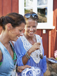 Women having outdoor lunch