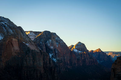 Scenic view of rocky mountains against clear sky