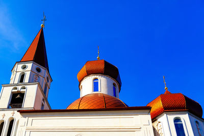 Dome and belfry architecture of orthodox church . red cupola top part of the church