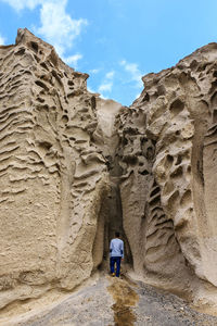 Man standing on rock formation