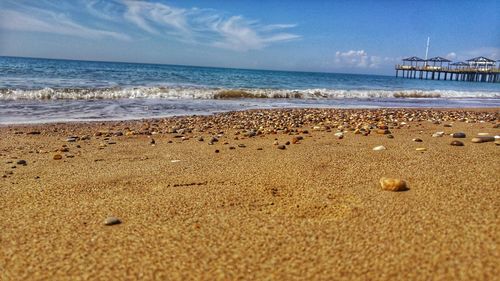 Scenic view of beach against sky