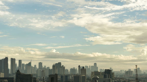 Modern cityscape against sky