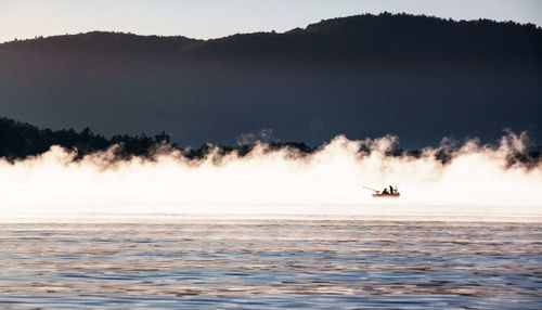 Boats sailing in sea