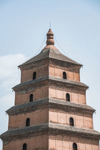 Low angle view of historic building against sky