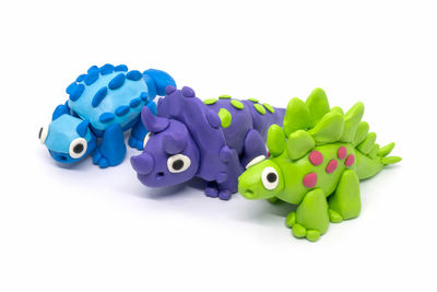 Close-up of multi colored toy against white background