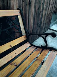 High angle view of wooden bench