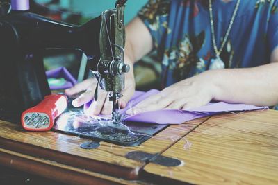 Midsection of woman working