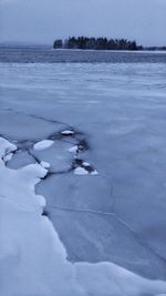 Frozen landscape during sunset