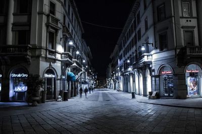 Illuminated street lights at night