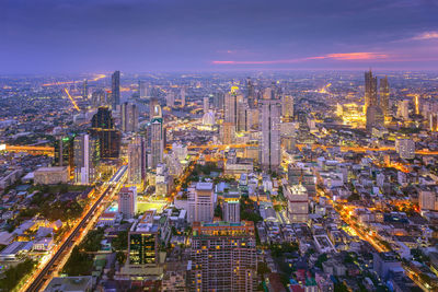 Amazing beautiful view of midtown bangkok city skyline and skyscraper at sunset.