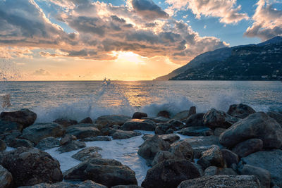 Scenic view of sea against sky during sunset