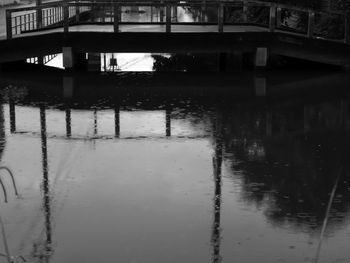 Reflection of building in puddle