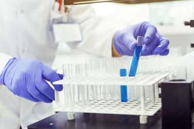 Cropped hands of person working in laboratory