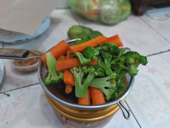 High angle view of vegetables in bowl on table