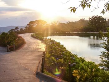 Scenic view of lake against sky during sunset