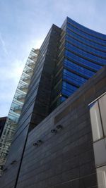 Low angle view of modern building against sky